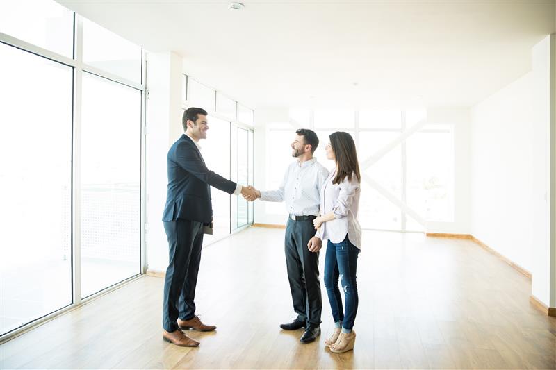 Key Lease Terms two people shaking hands